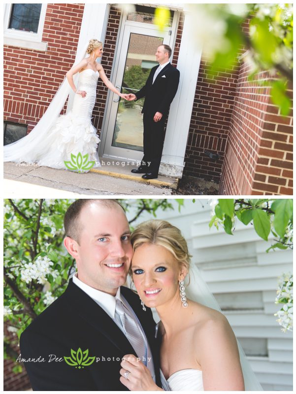 wedding photo of bride and groom golding hands and in flowering tree