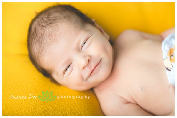 Baby Boy Newborn Photography Big smile yellow