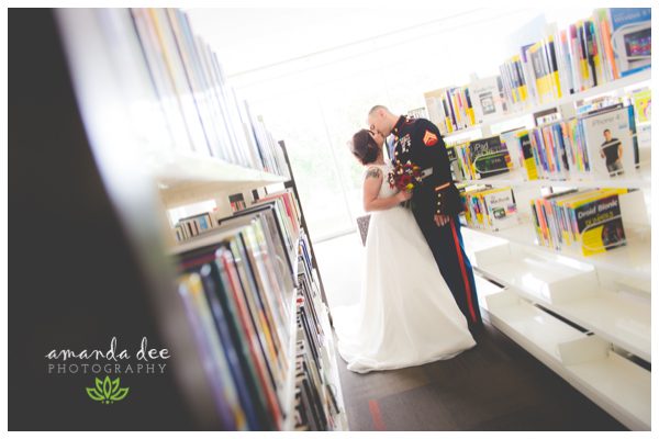 Sunset Downtown Library Rooftop Wedding Amanda Dee Photography Broom and Groom inside modern library bookshelves