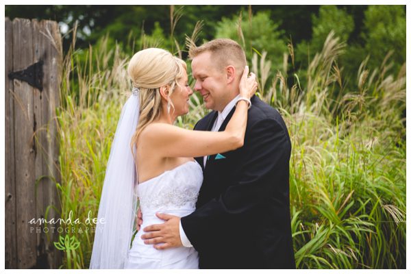 Summer Wedding Teal Accents - Amanda Dee Photography - Bride and Groom Candid moment